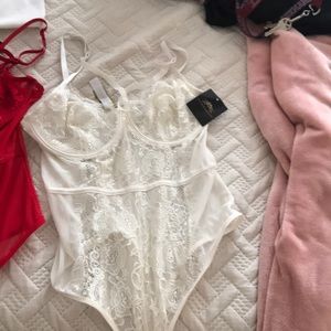 White lingerie bodysuit from FashionNova